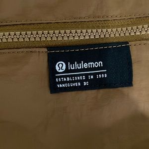 Lulu lemon clean lines crossbody bag . Burnt camel/ black